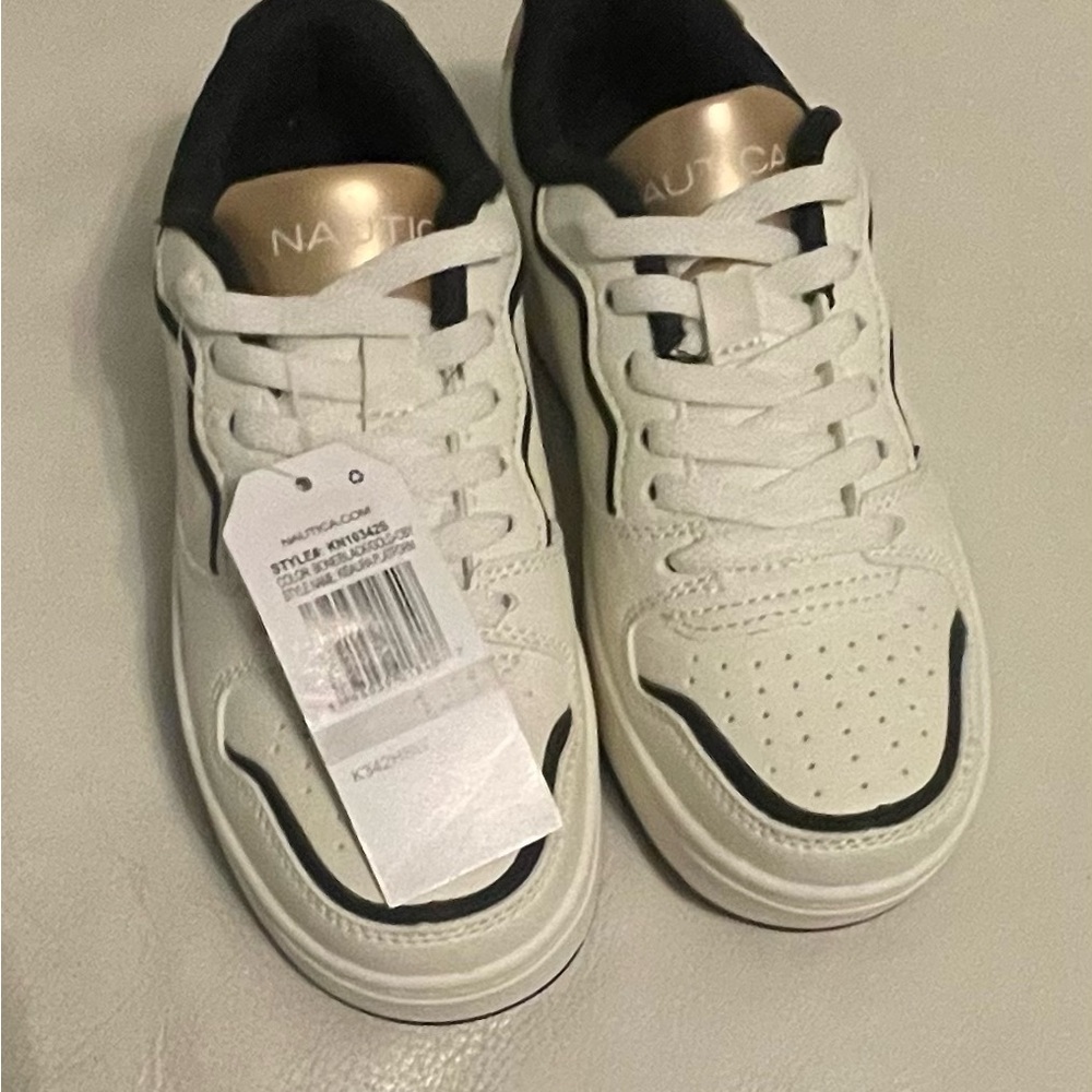 Nautica White Sneakers with Black Trim and Gold Tongue Detail
